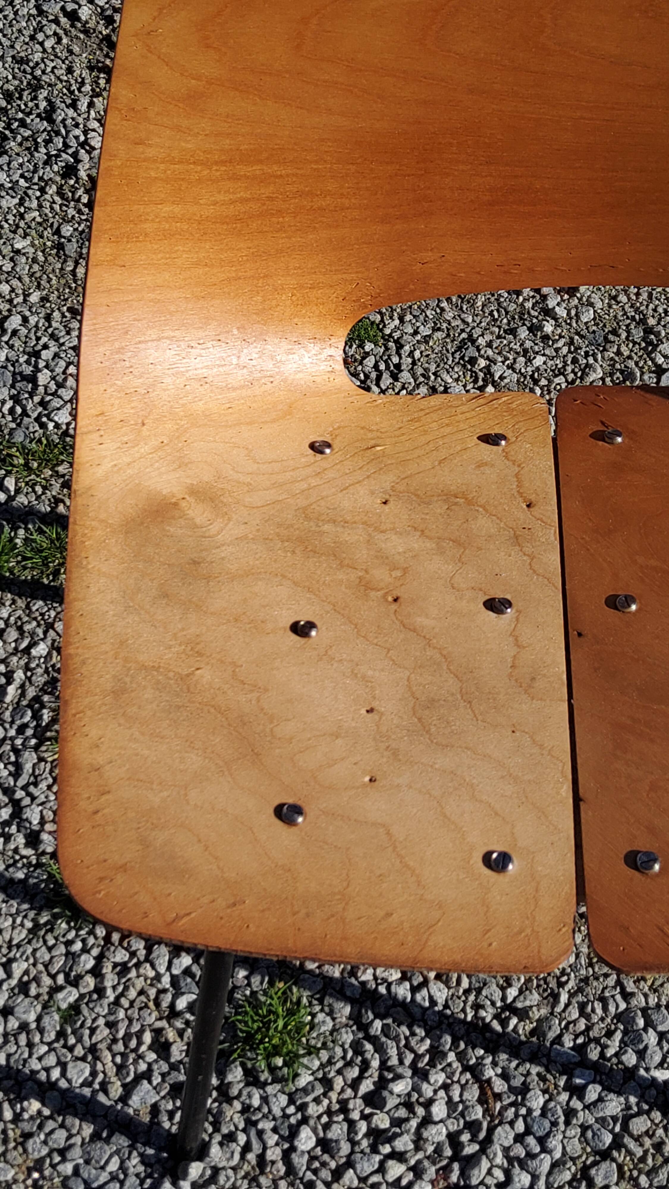 Pair of tonneau chairs by Pierre Guariche plywood base tubes 1954