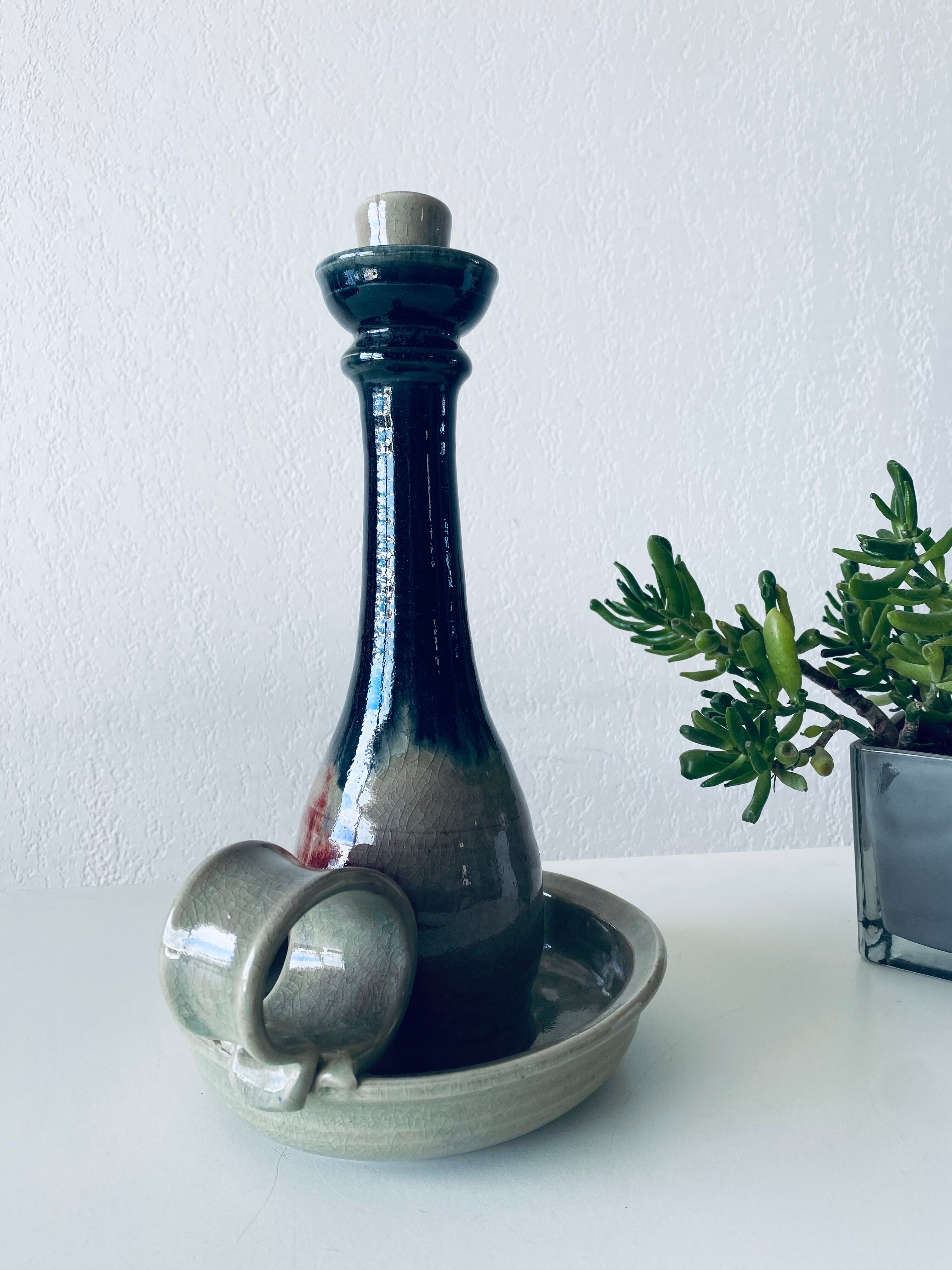 Candle holder in glazed ceramic