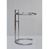 Adjustable height side table in the style of Eileen Gray.