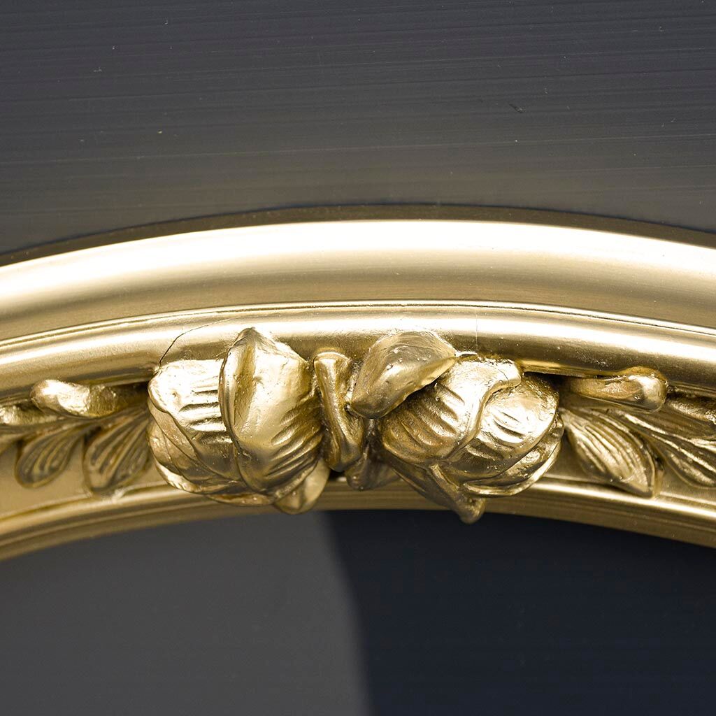 Delightful empty old gilded oval frame with carved wood and stucco flowers 63 x 53