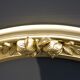 Delightful empty old gilded oval frame with carved wood and stucco flowers 63 x 53