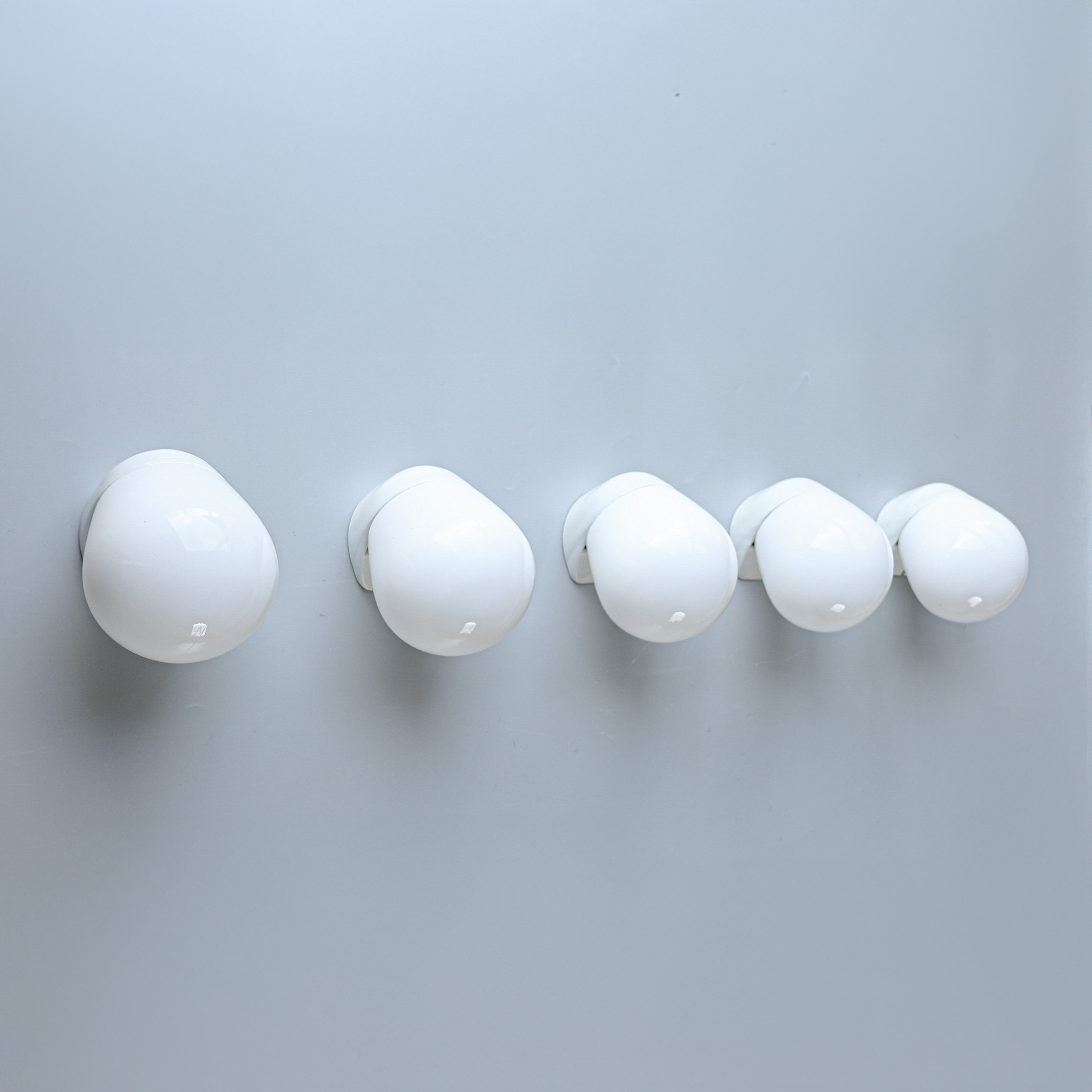 Wilhelm Wagenfeld, ceiling lights, porcelain, 1950s.