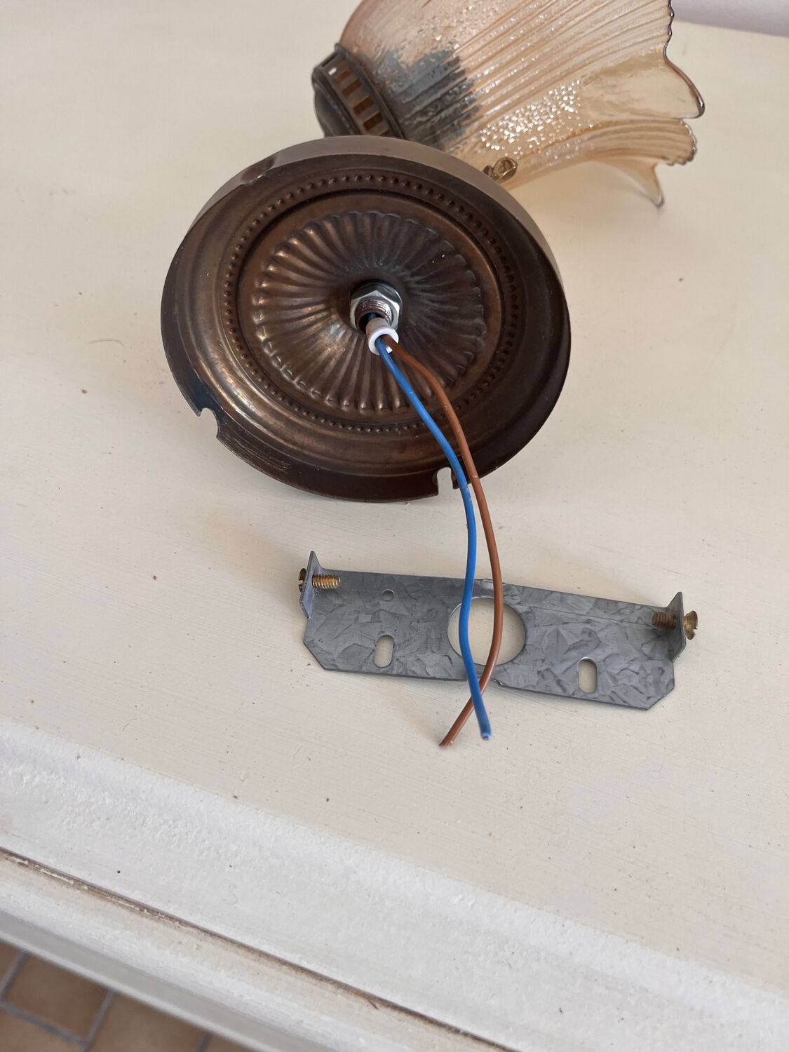Old wall lamp with glass tulip