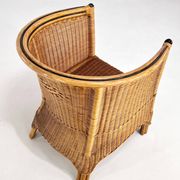 Pair of cabriolet armchairs in wicker and black edging