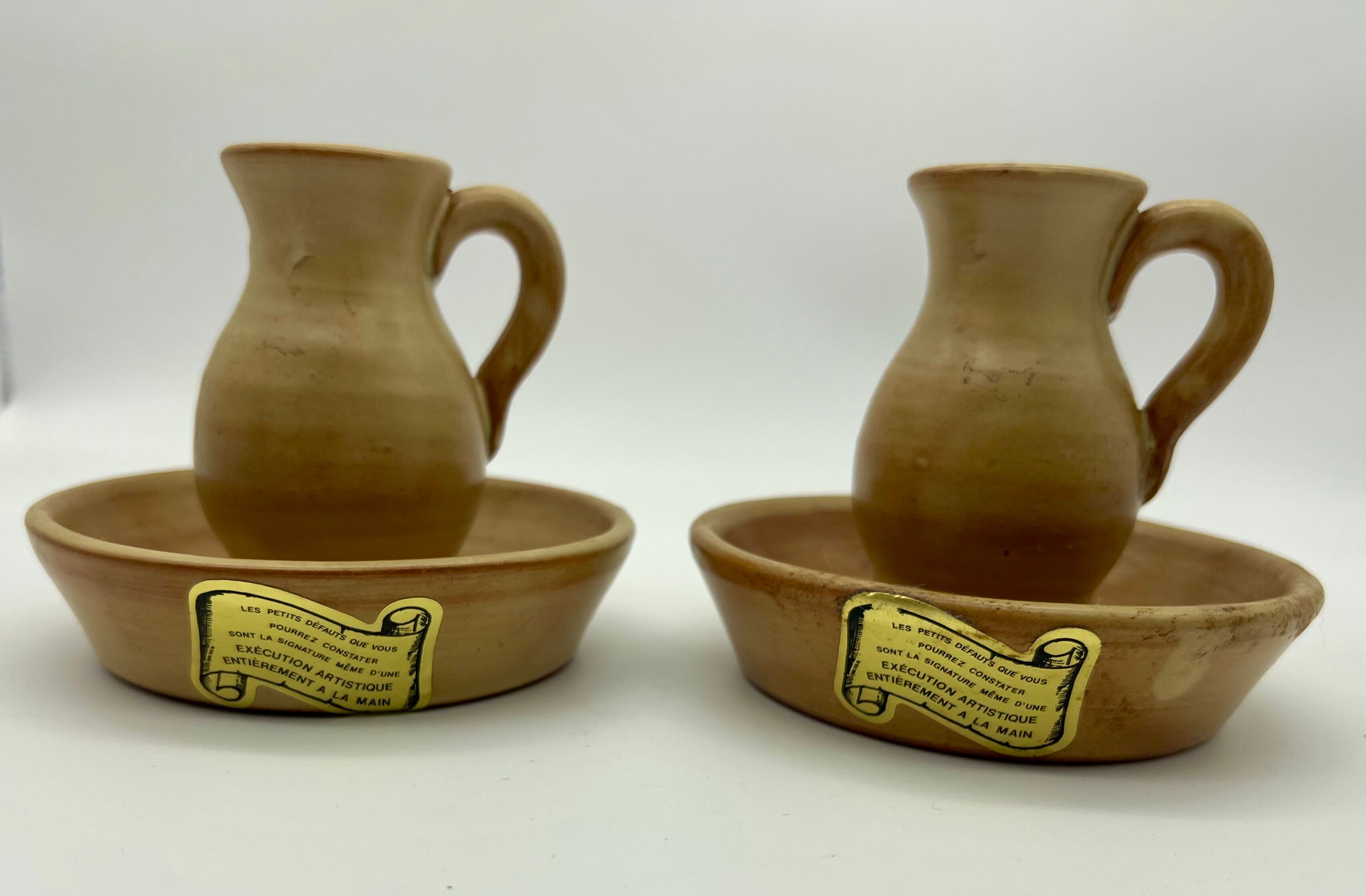 Pair of stoneware candle holders