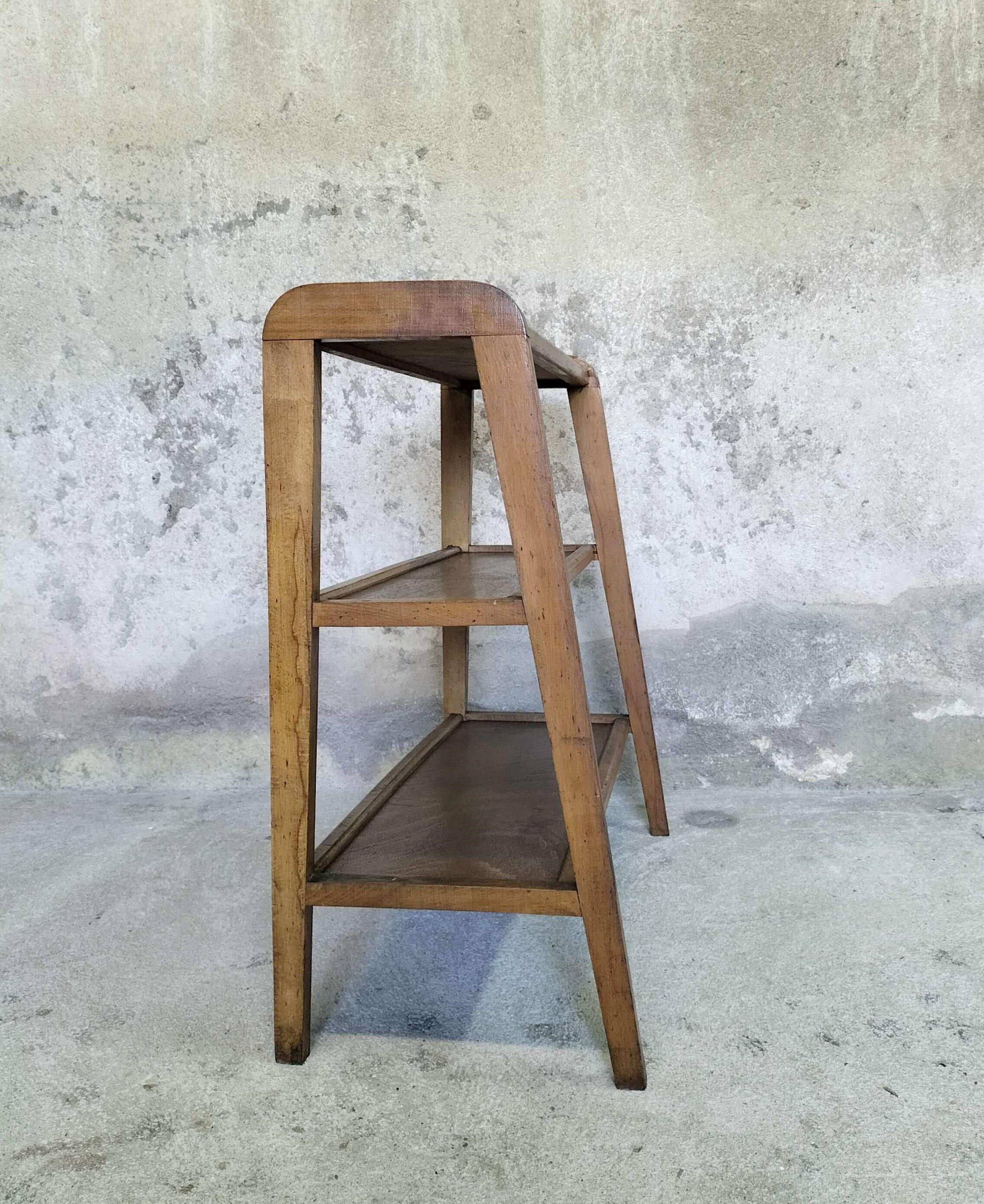 Vintage shelf on wooden legs in wood