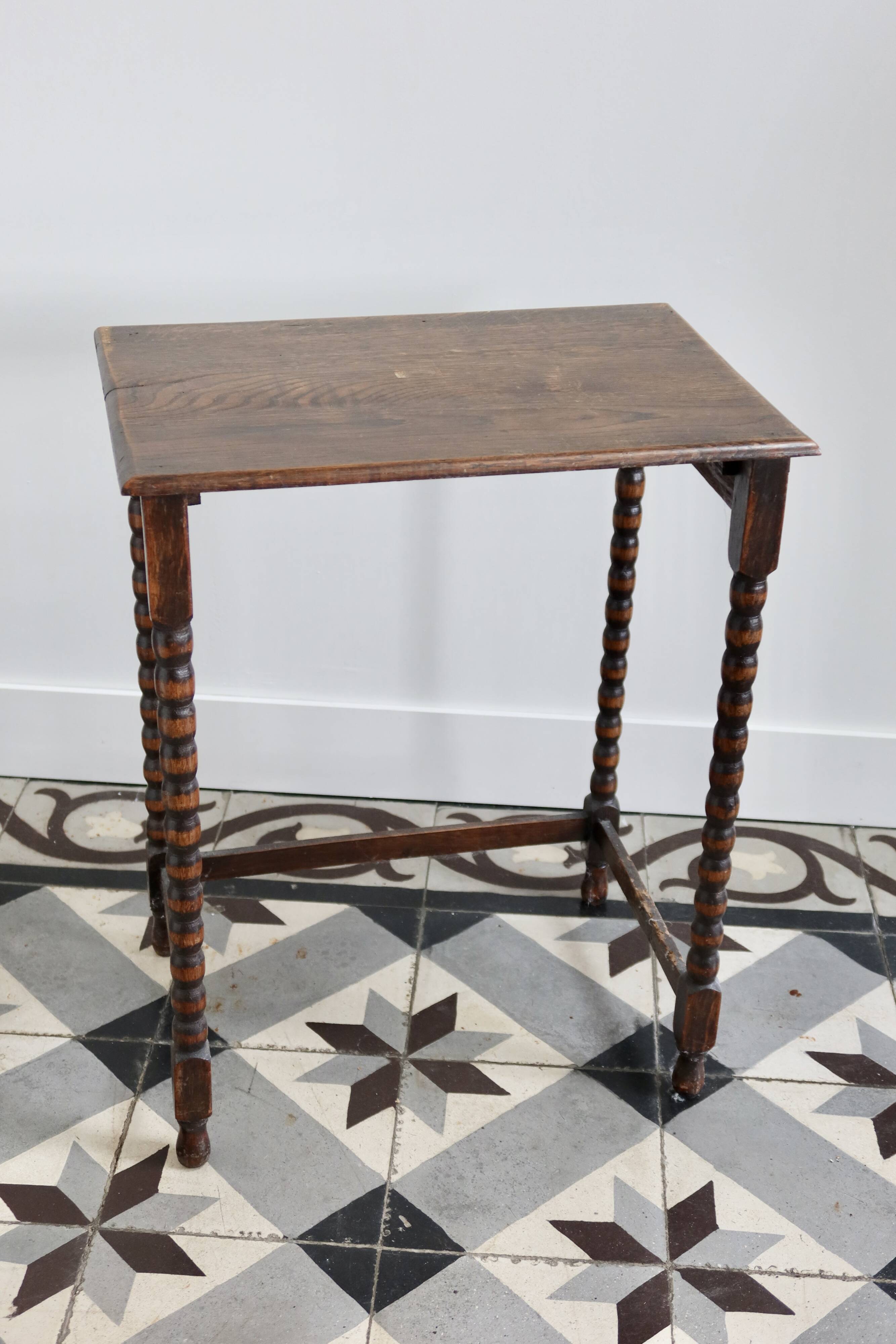 4 antique nesting tables made of turned wood