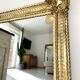 Mirror from the Restoration period, antique gilded, 19th century.