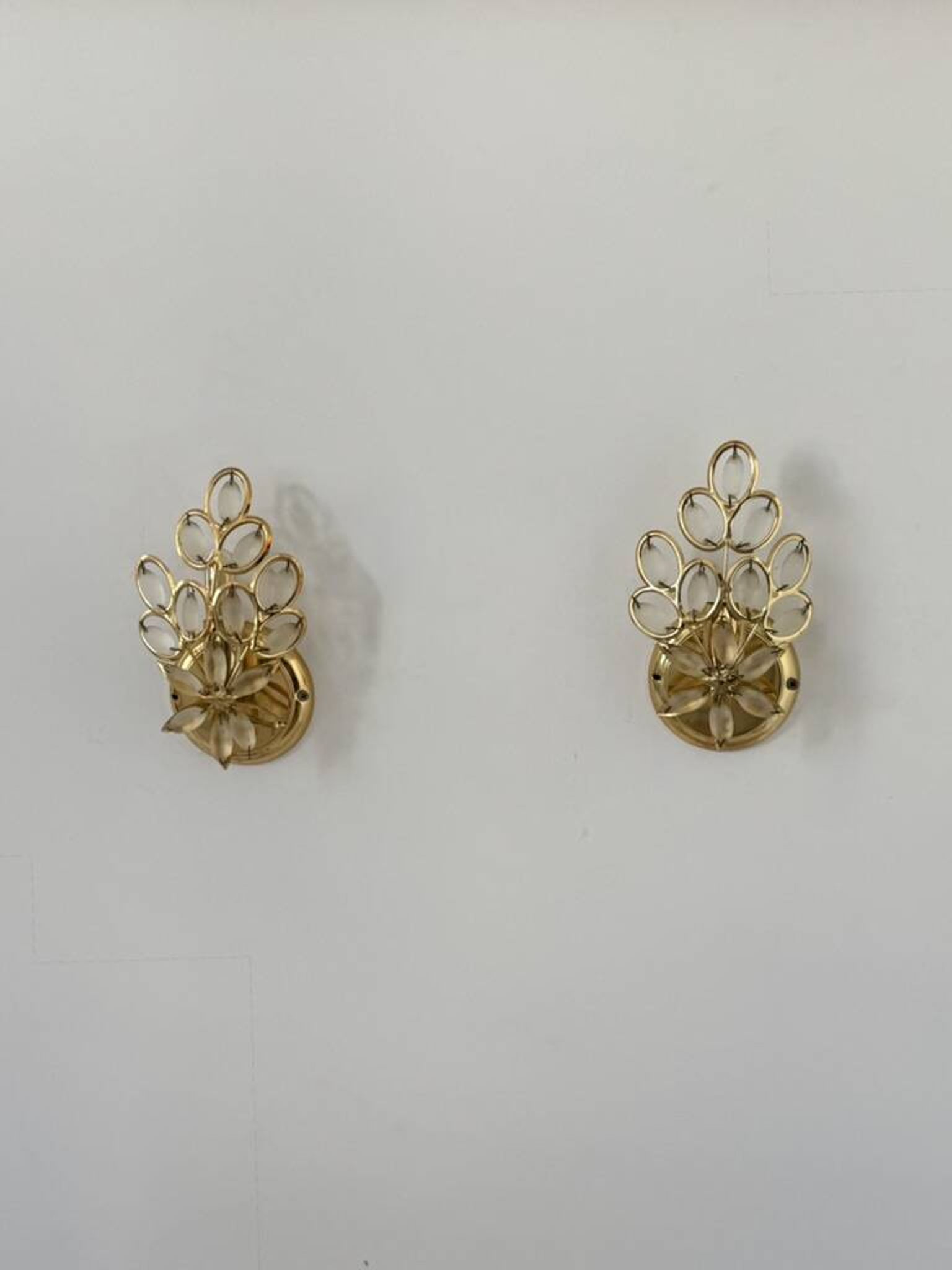 Pair of vintage brass wall lights with pendants, France, 1980.