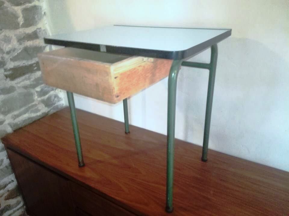 Child in formica desk