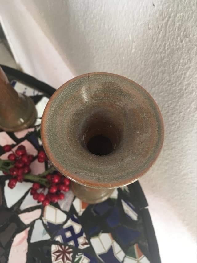 Terracotta candlesticks signed