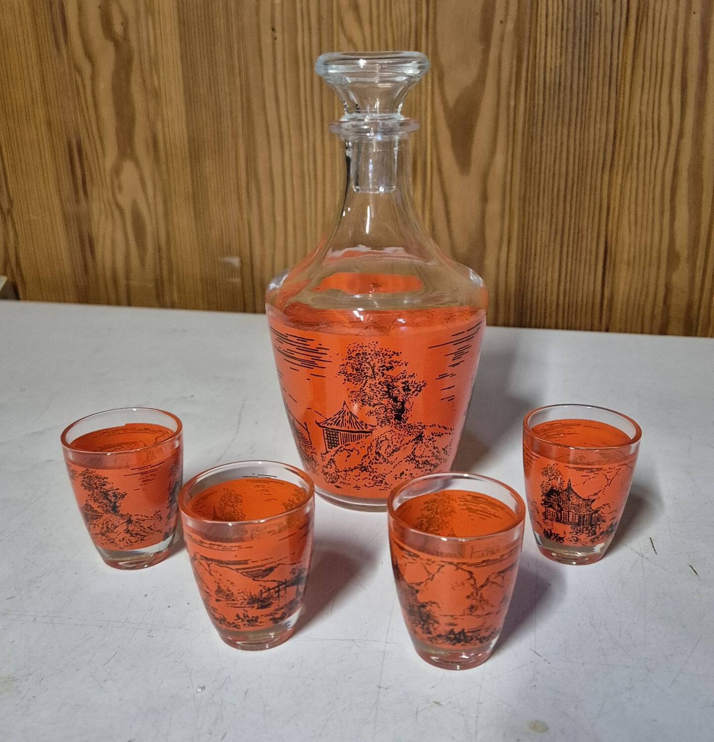 Decorated glass liqueur set, carafe and 4 glasses with asian scene