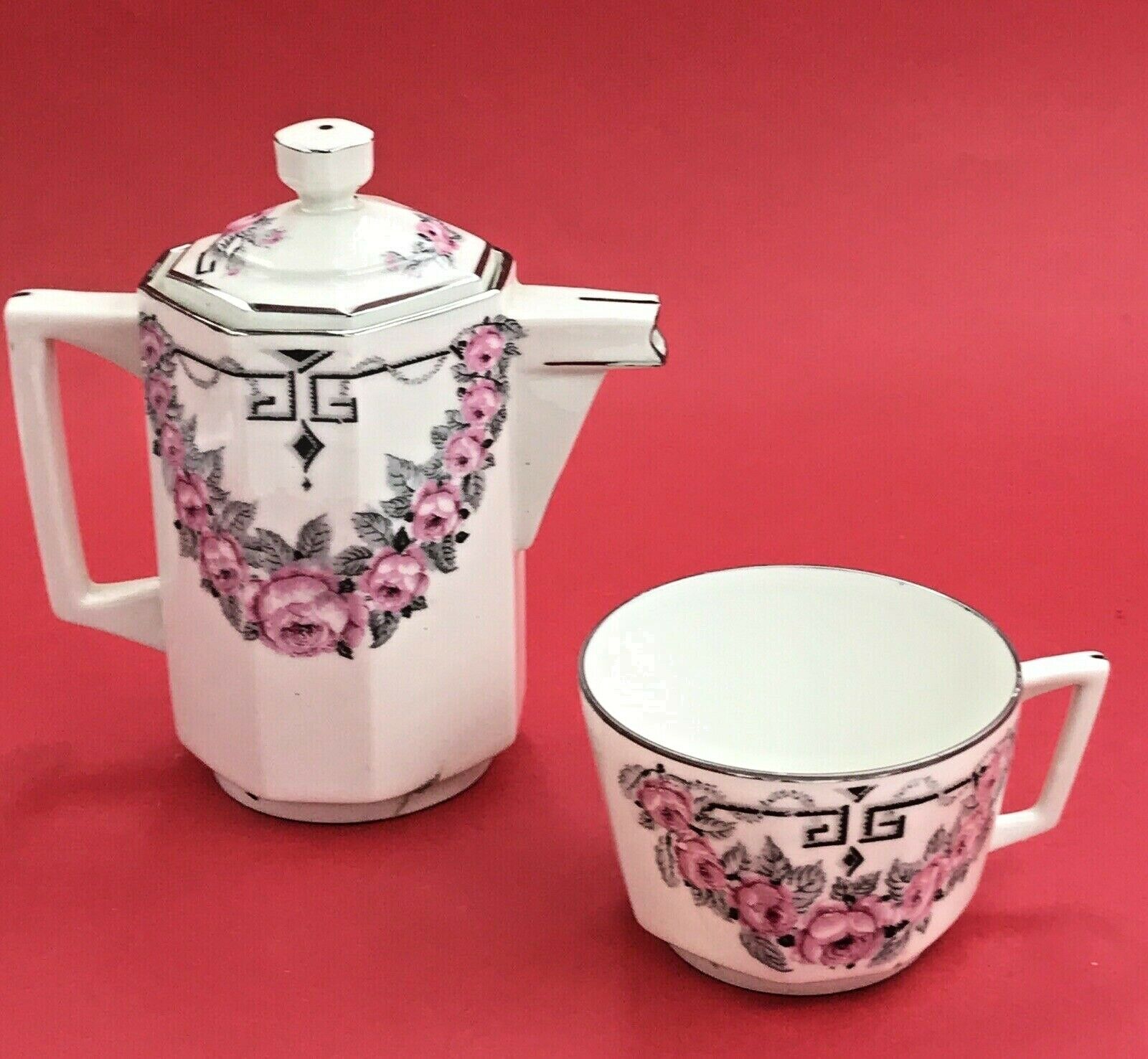 Selfish teapot and cup art deco porcelain from limoges astral roses pink & gray