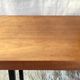 Modernist side table in solid wood and black lacquered metal 50s/60s