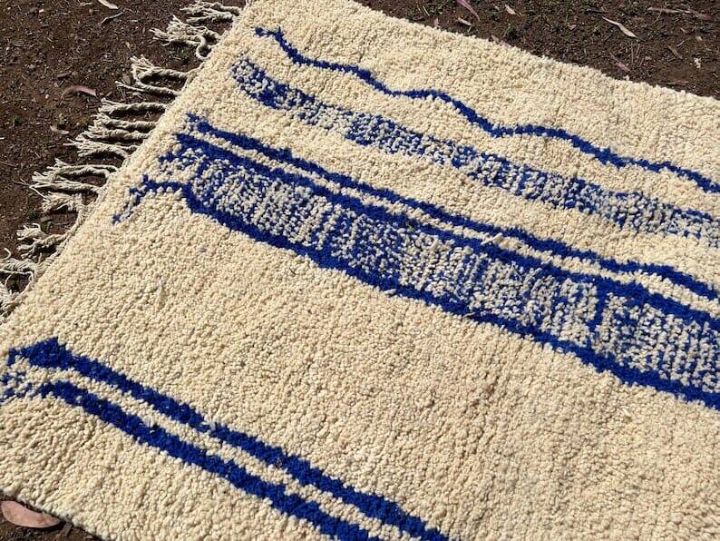 Handmade Moroccan Azilal rug in blue and white, 150/250 cm.