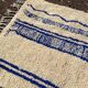 Handmade Moroccan Azilal rug in blue and white, 150/250 cm.