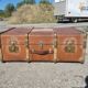 Old travel trunk made of wood and brass