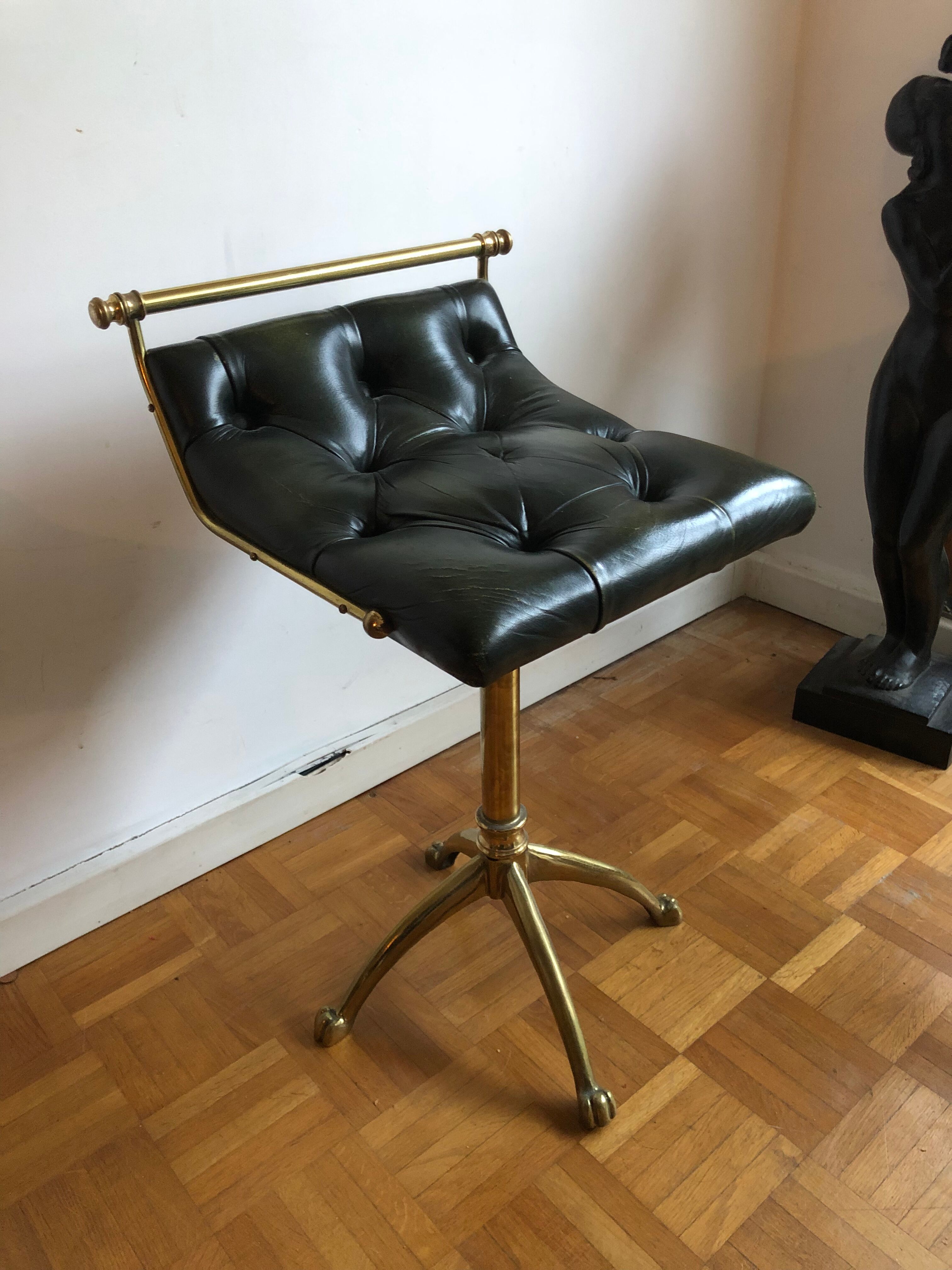 Pair of Chesterfield style brass and leather stools