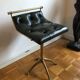 Pair of Chesterfield style brass and leather stools