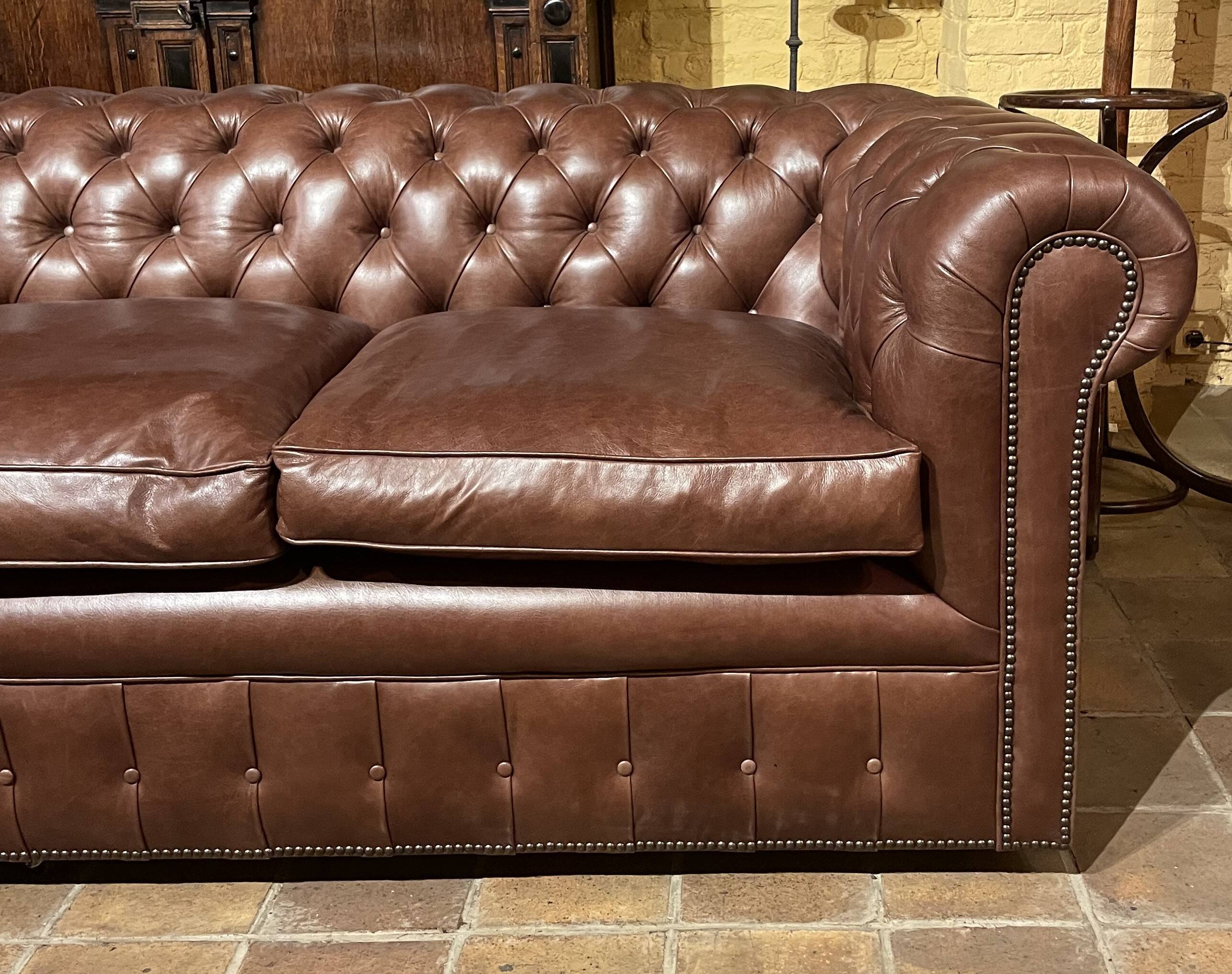 brown leather 3-seater Chesterfield sofa