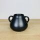 Black ceramic vase from the 1950s.