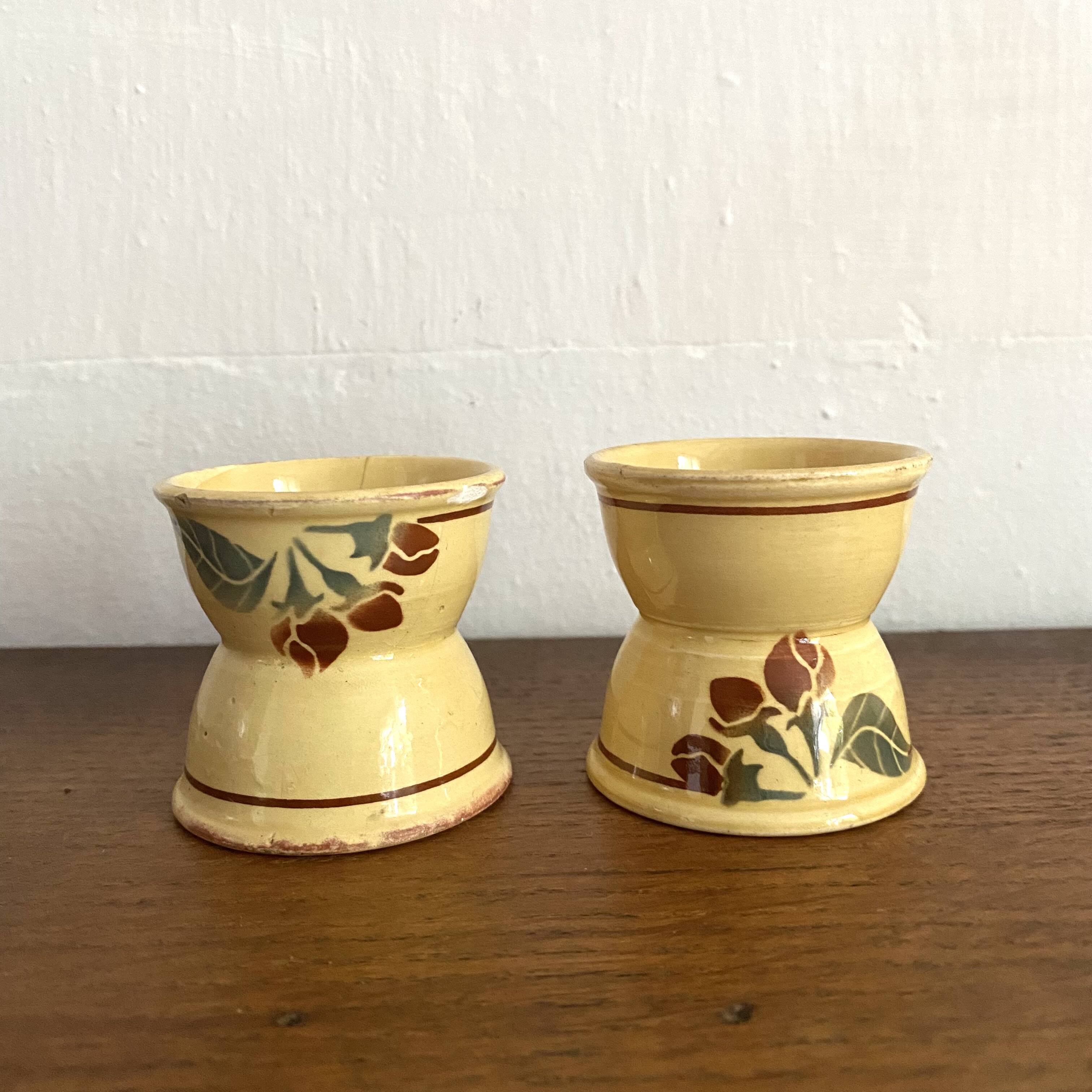 Antique diabolo egg cups