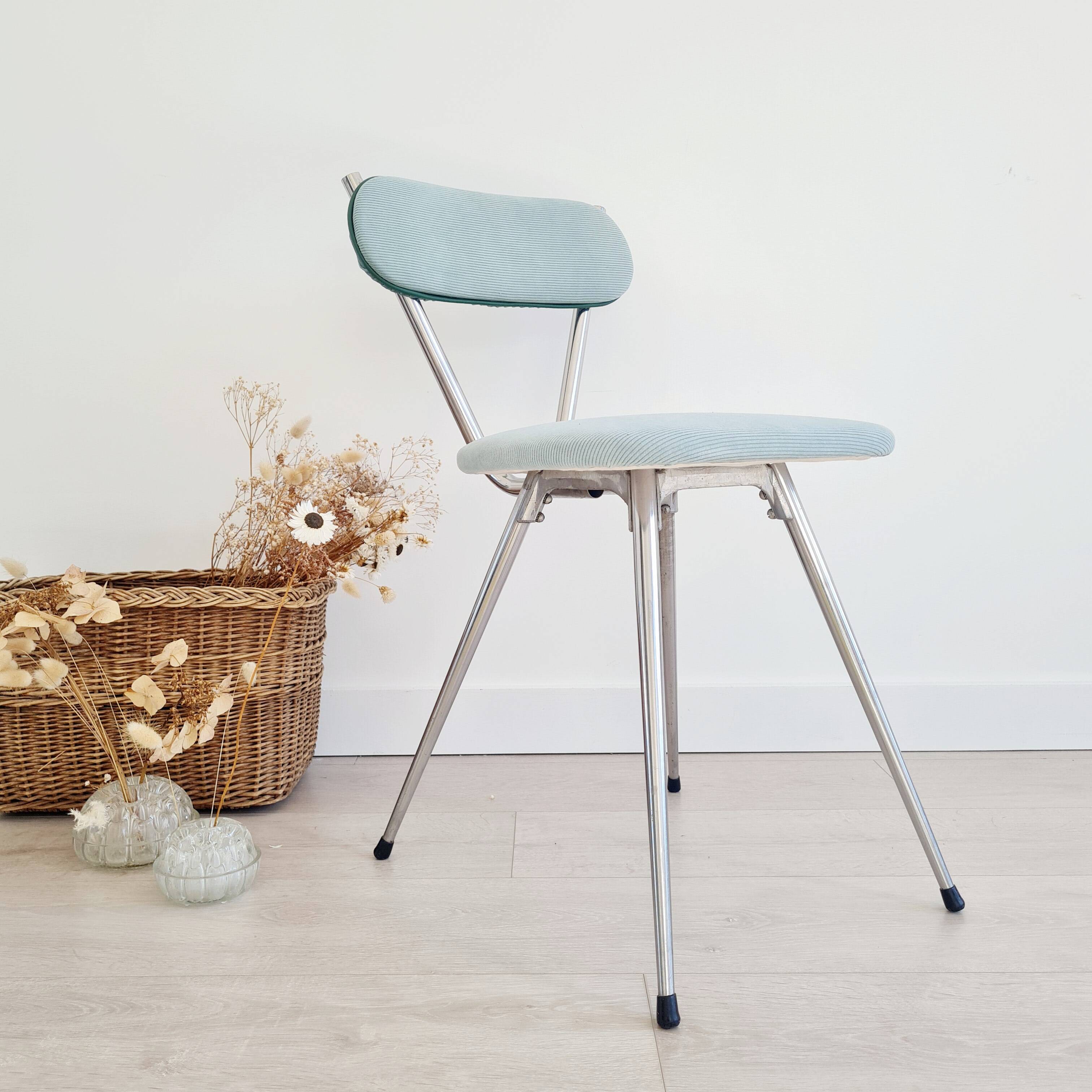 Old chrome metal and blue velvet chair
