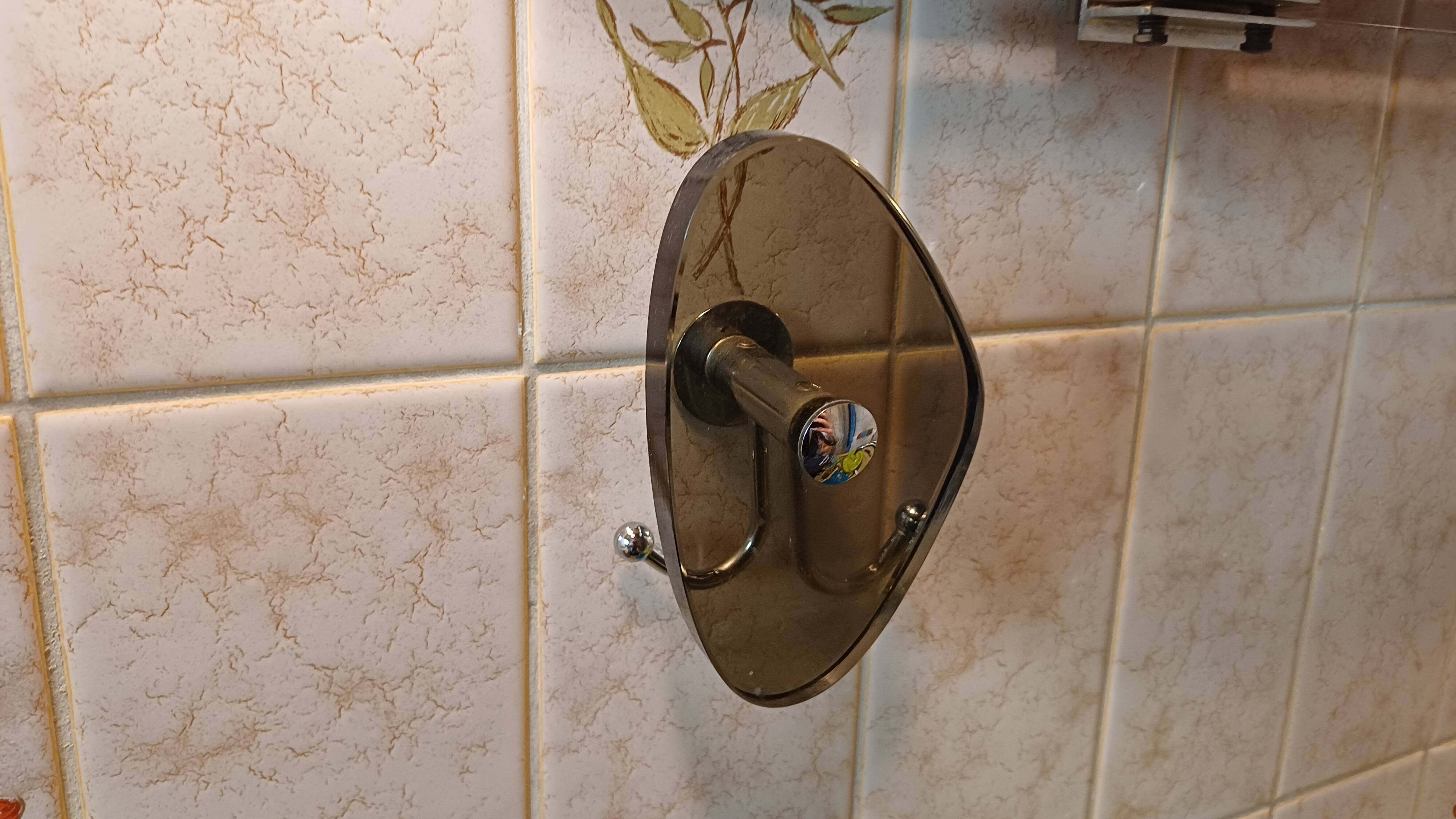 Vintage bathroom mirror with hooks