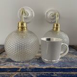 Pair of wall sconces glass globes