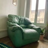 New armchair in vintage green leather