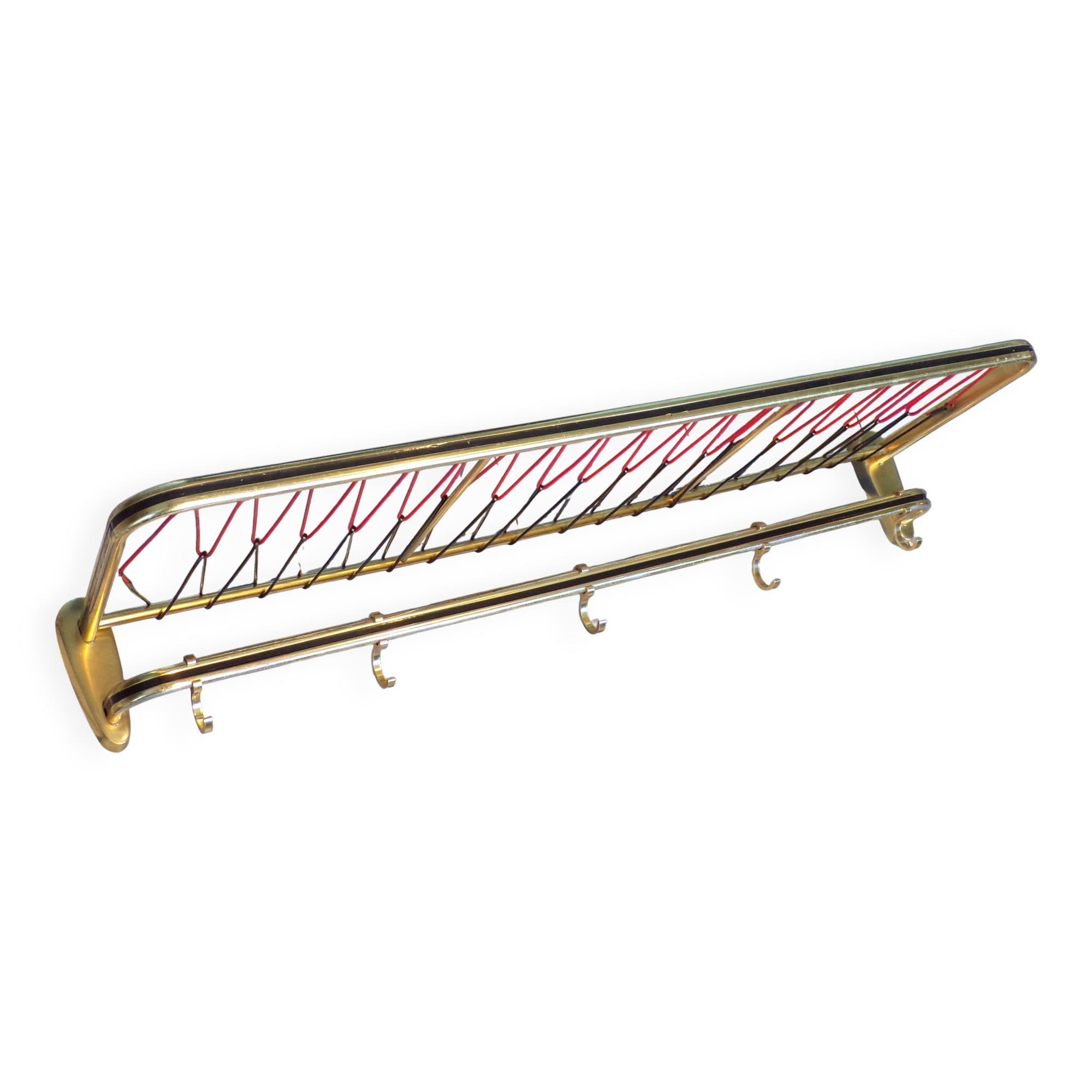Coat rack styled like a train luggage rack, length = 81 cm.