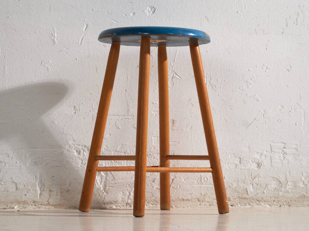 Antique wooden stool with a round seat – Central Europe, around 1950