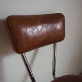 Brown faux leather chair