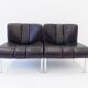 Eurochair set of 2 black leather lounge chairs by Girsberger