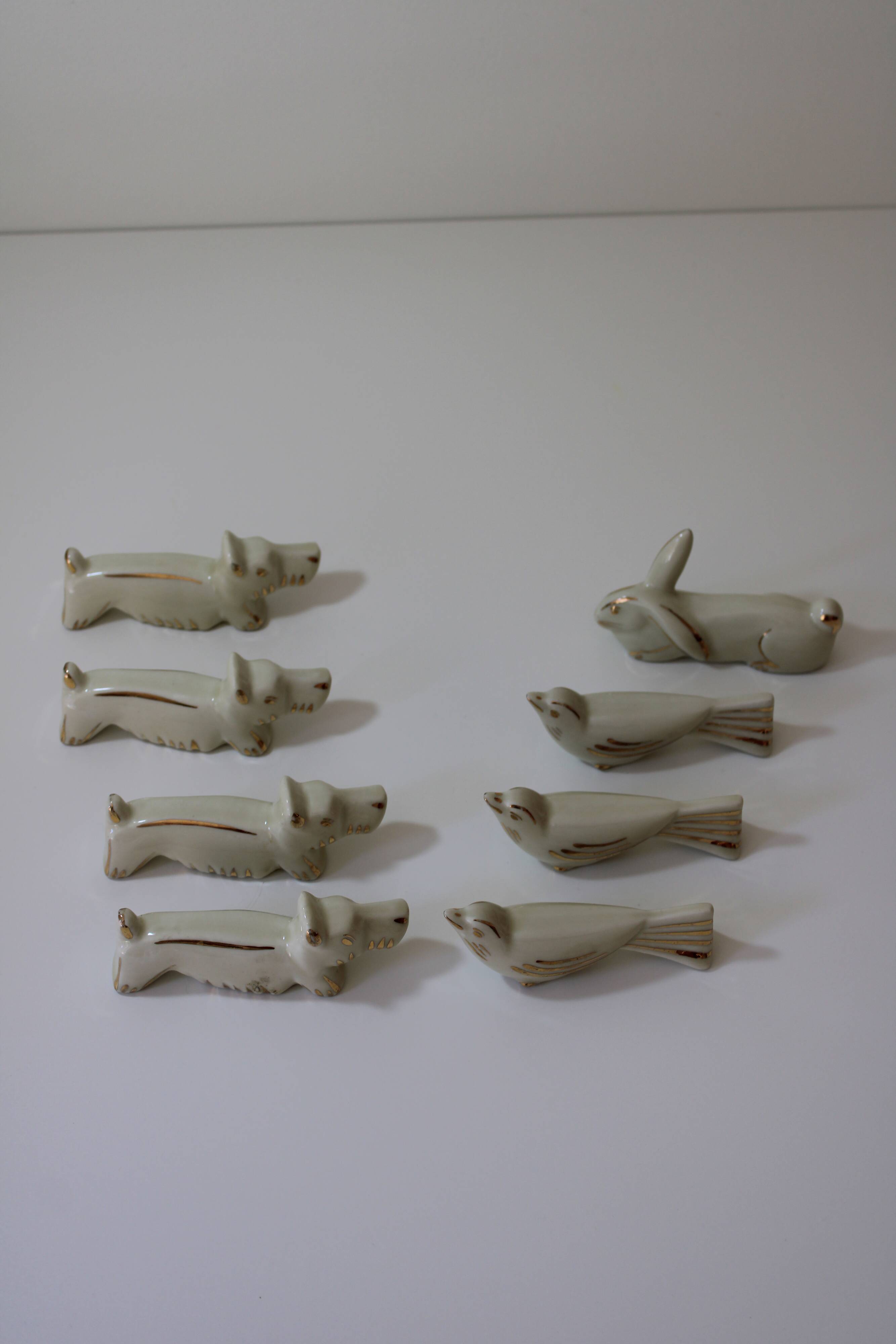 8 portes couteaux animaux porcelaine de Limoges vintage
