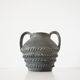 Vase with double handle in black sandstone