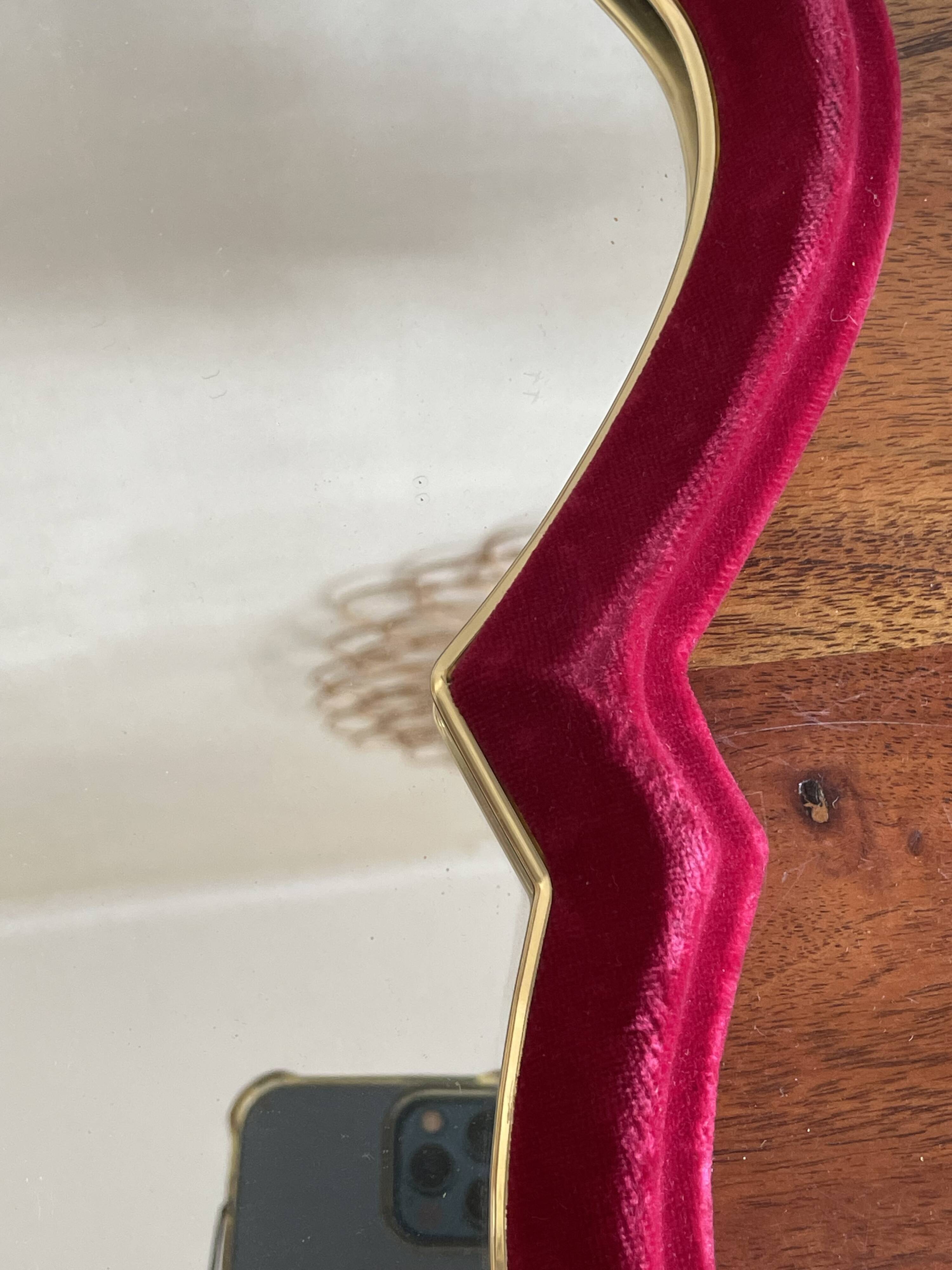 Red and gold felt mirror