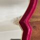 Red and gold felt mirror