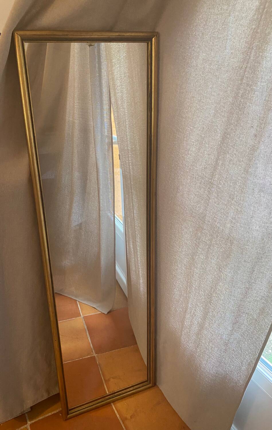 Large and old wooden mirror