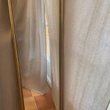 Large and old wooden mirror