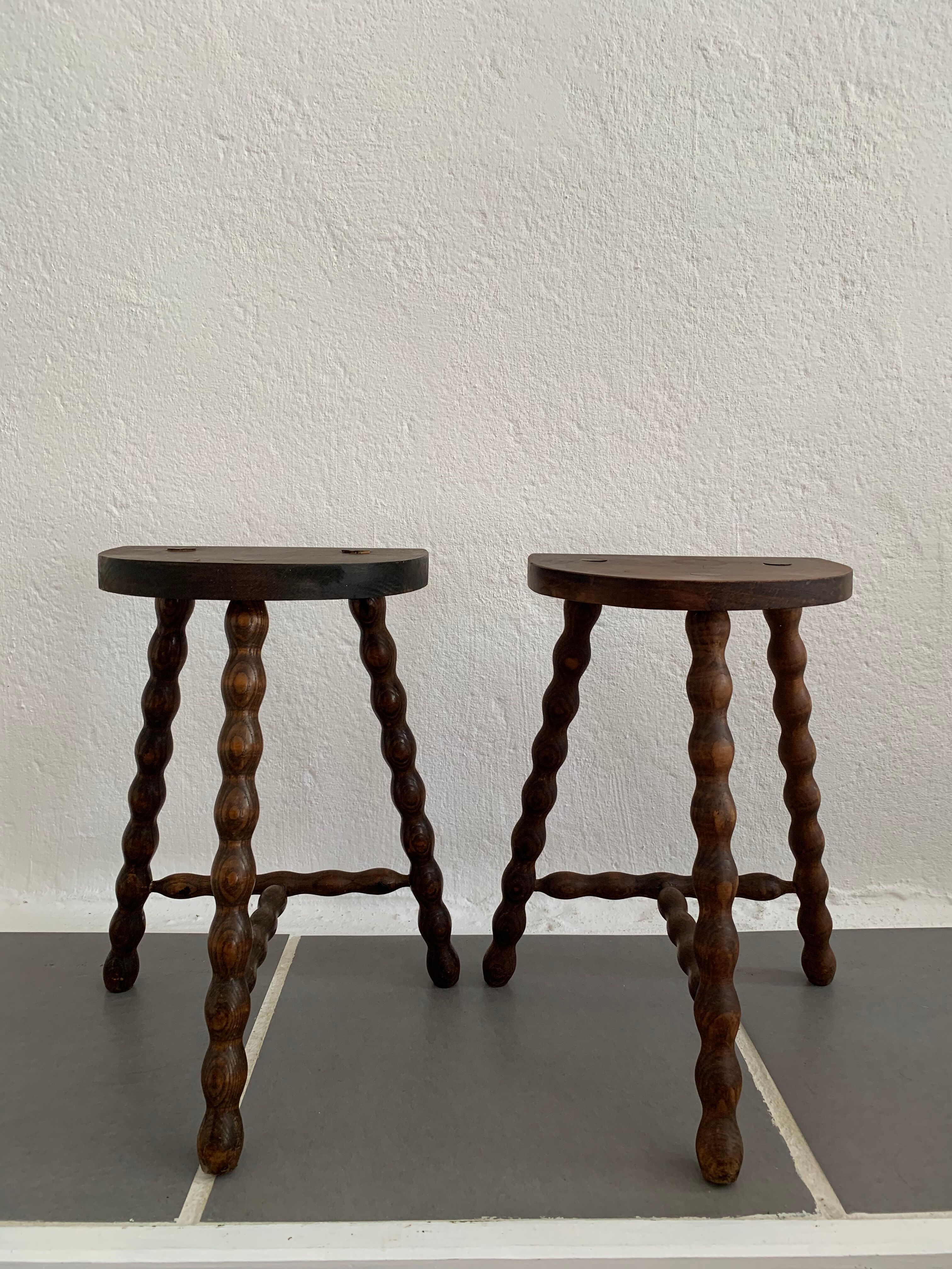 Pair of tripod stools turned wood