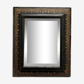 Old beveled mirror with black and gold leather binding Napoleon III