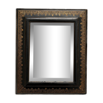 Old beveled mirror with black and gold leather binding Napoleon III