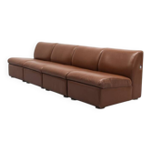 Canapé modulable en cuir cognac par Artifort