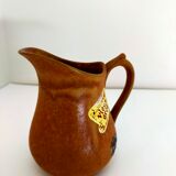 pitcher in old sandstone