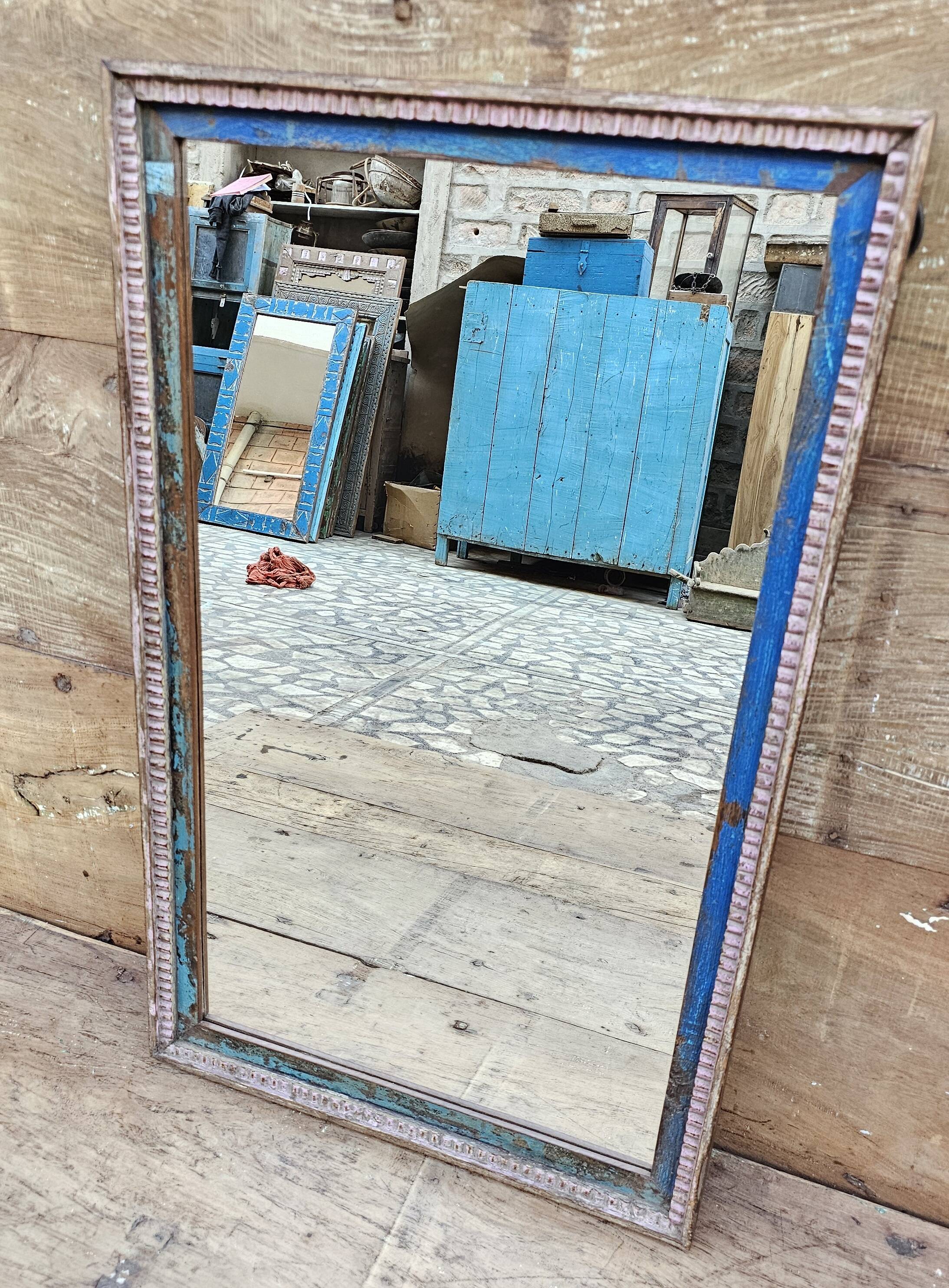 Old art deco mirror in burmese teak