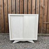 Vintage sideboard with sliding doors