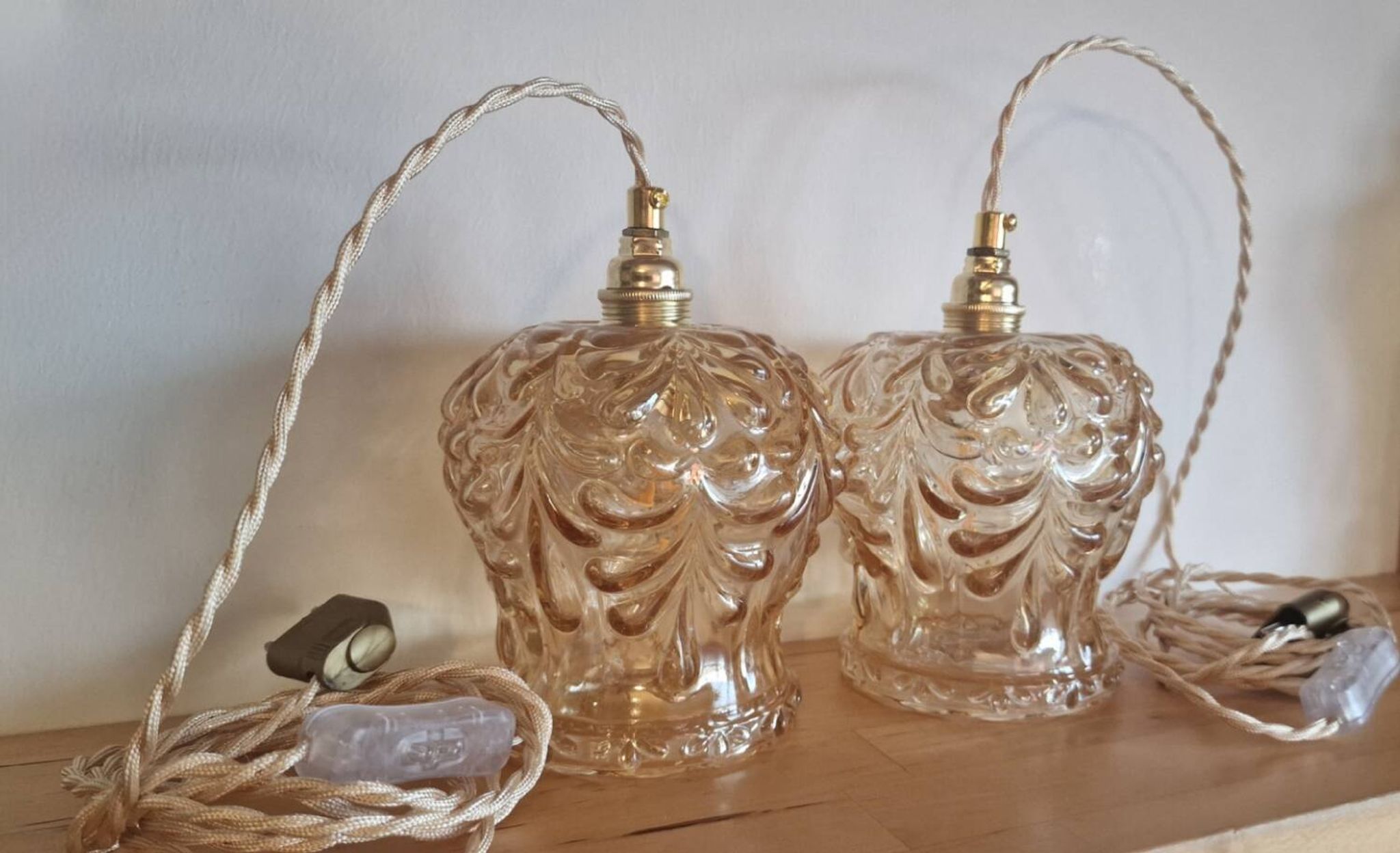 Duo of amber molded glass portable lamps