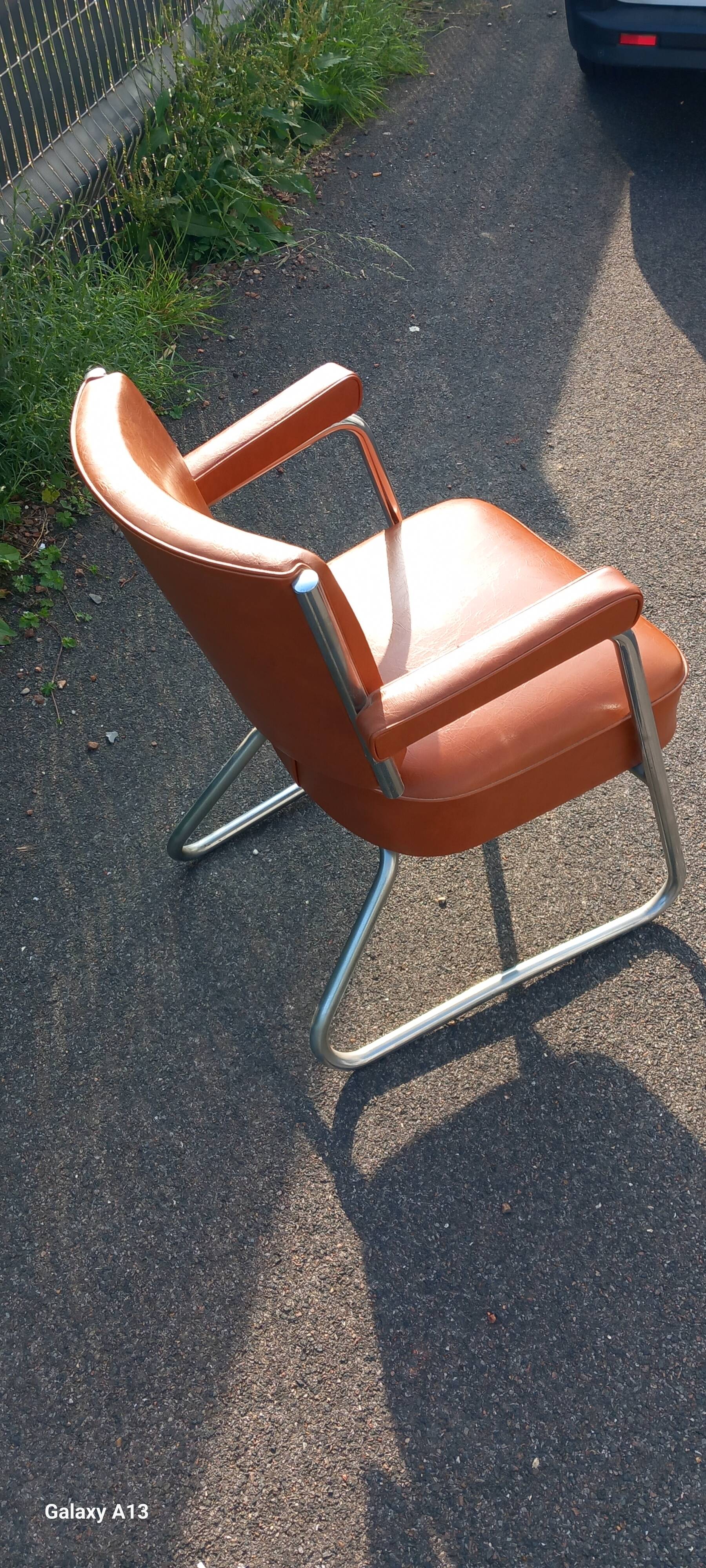 Vintage leatherette and chrome armchair