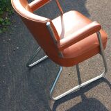 Vintage leatherette and chrome armchair